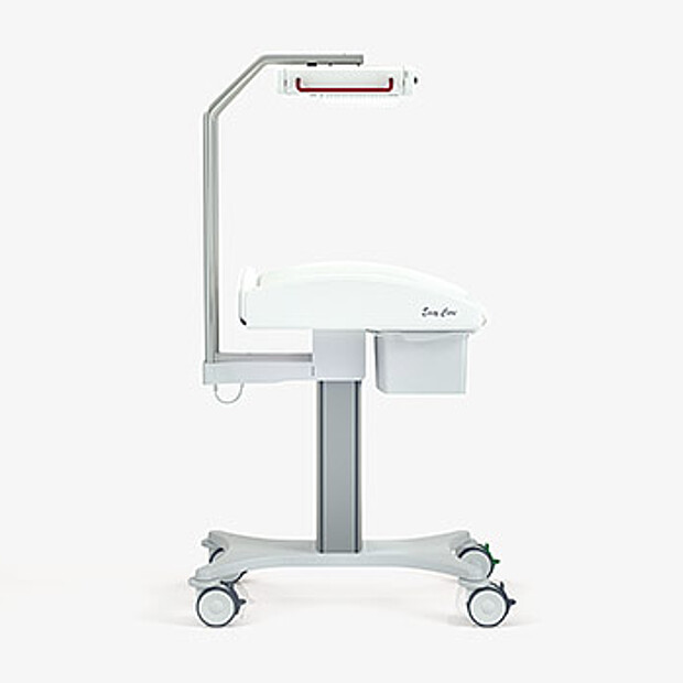 Mobile baby changing and examination unit with integrated radiant warmer